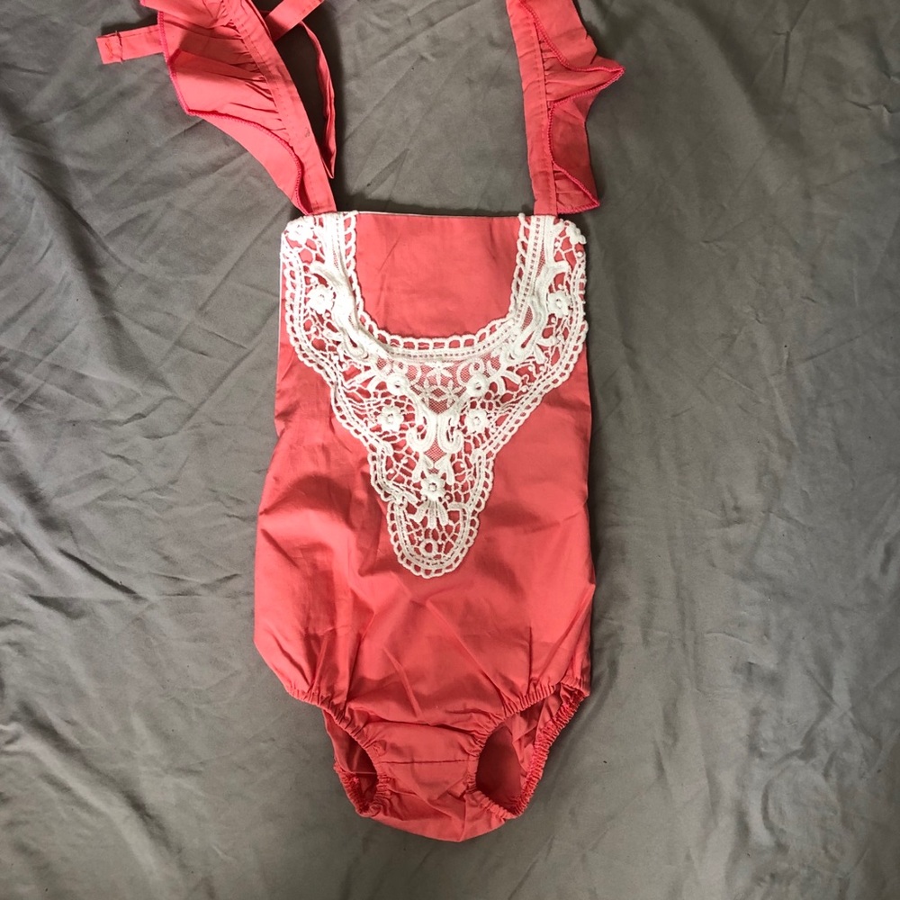 Frilly infant onesie